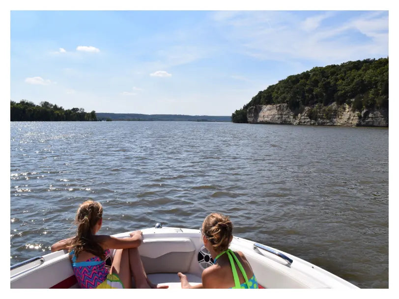 View of the Illinois River and bluffs from the back of a boat